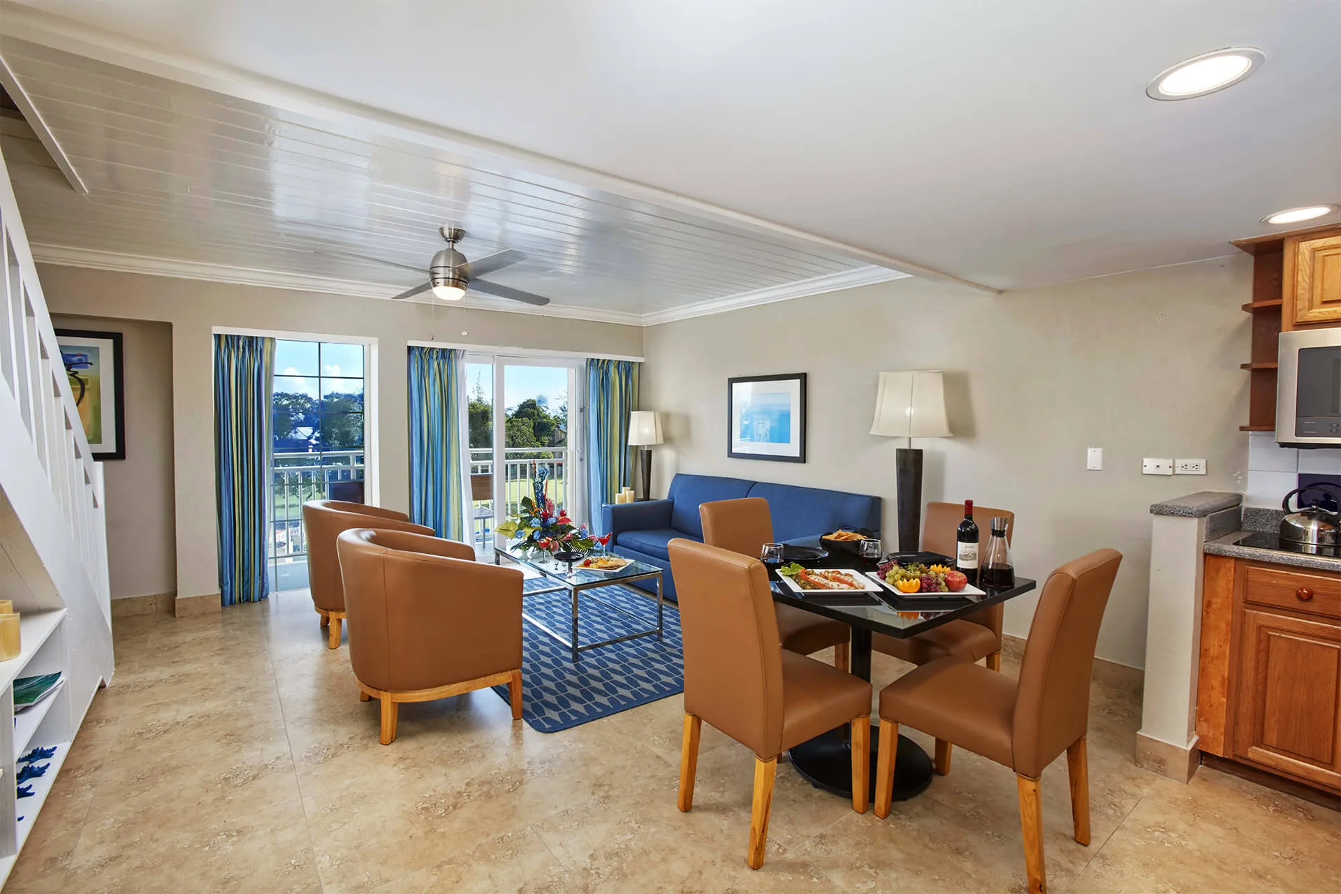 One-bedroom garden view suite living and dining area at Divi Southwinds Beach Resort