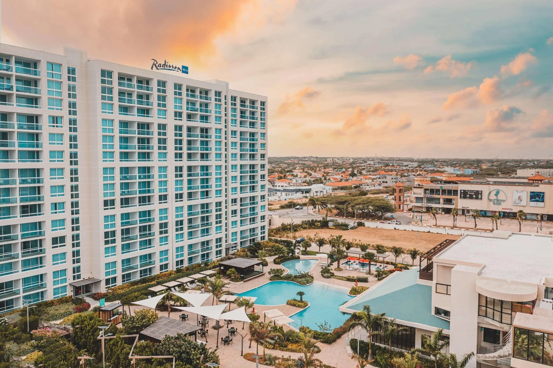 Radisson Blu Aruba modern Palm Beach resort with rooftop pool suites and hotel-strip convenience