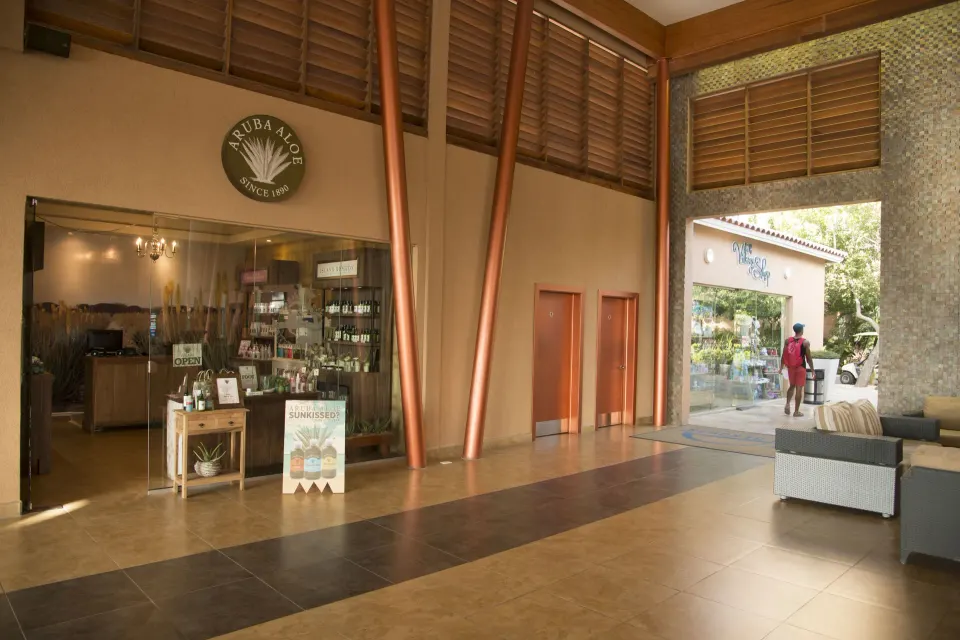 Covered resort walkway with shops at Divi Village Golf & Beach Resort.