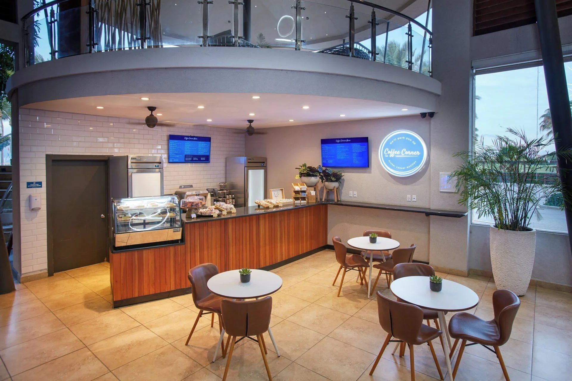 Coffee Corner café counter and seating area at Divi Village Golf & Beach Resort.