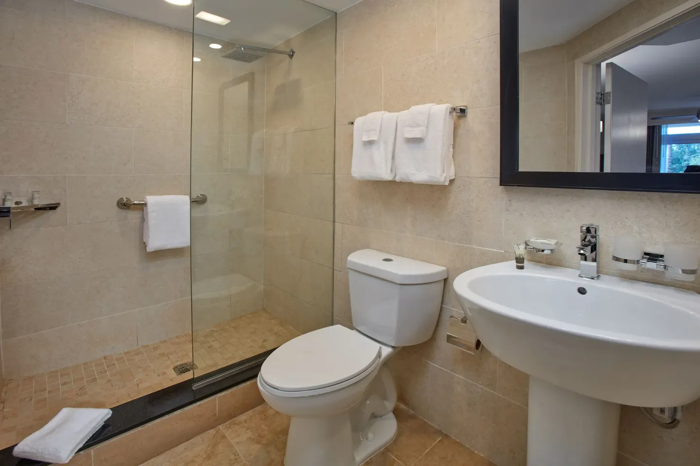 Golf Villa 1 Bedroom Suite bathroom shower and sink at Divi Village Golf & Beach Resort.