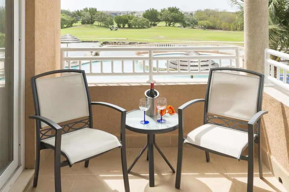 Golf Villa Studio Suite balcony overlooking golf grounds at Divi Village Golf & Beach Resort.
