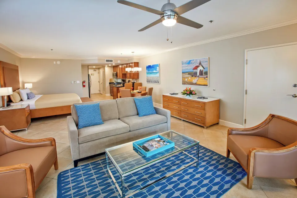 Golf Villa Studio Suite living area and king bed at Divi Village Golf & Beach Resort.