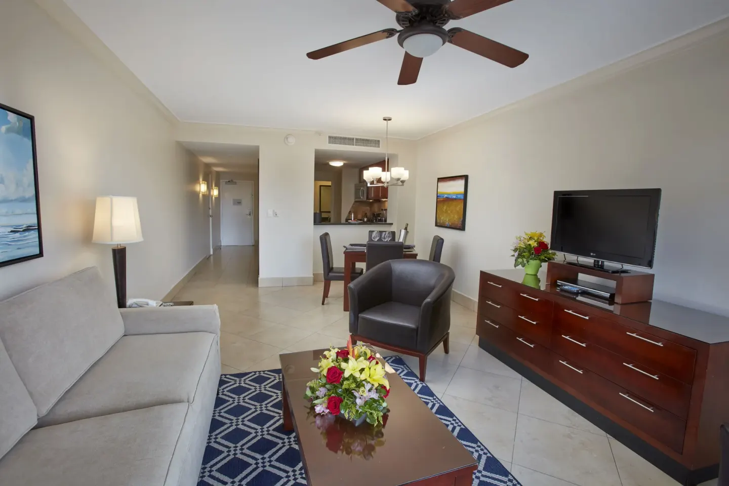 One Bedroom Suite living area and dining table at Divi Village Golf & Beach Resort.