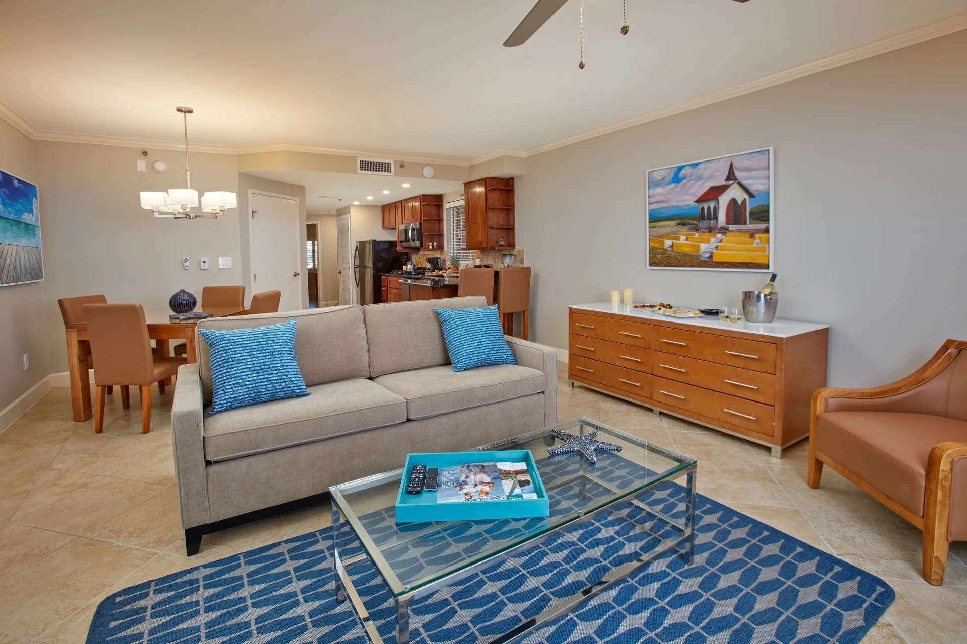 One-bedroom suite living room, dining area, and kitchen at Divi Village Villas.