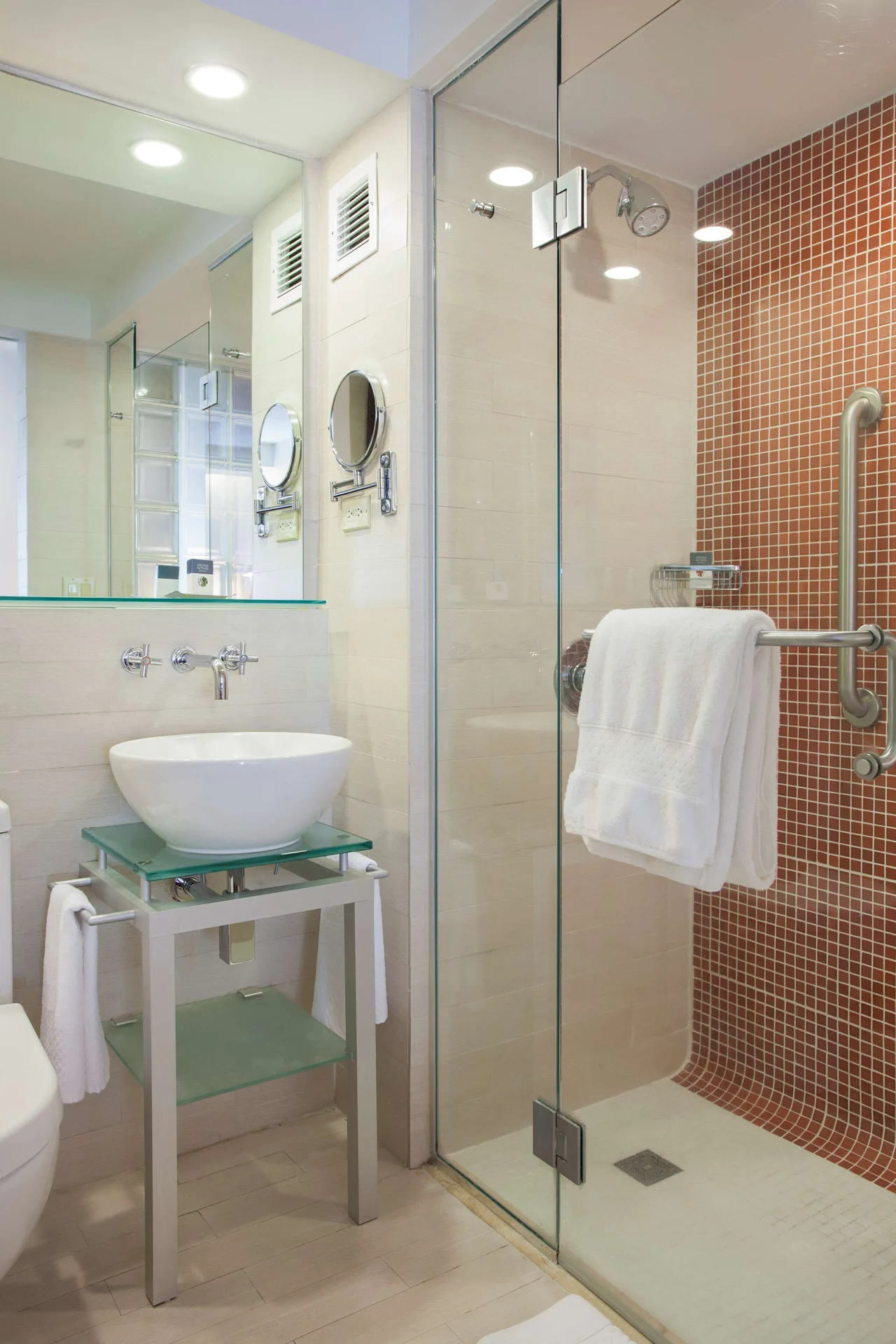 Standard Room bathroom at DoubleTree San Juan with vessel sink and glass shower.