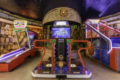 Arcade machines and dance game at Dreams Riviera Cancun Resort & Spa.
