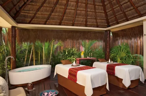 Spa treatment cabana with two massage beds at Dreams Riviera Cancun Resort & Spa.