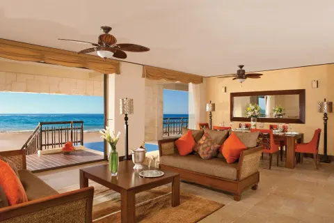 Oceanfront Governor Suite lounge with sea views at Dreams Riviera Cancun Resort & Spa.