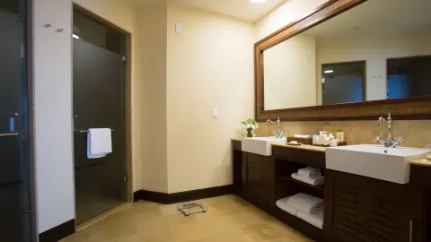 premium Ocean Front Master Suite double vanity at Dreams Riviera Cancun Resort & Spa.