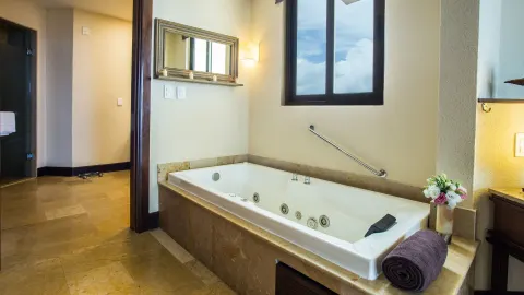 premium Ocean Front Master Suite whirlpool tub at Dreams Riviera Cancun Resort & Spa.