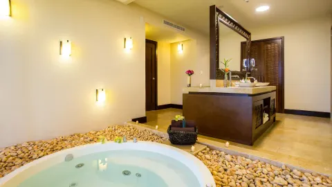 Presidential suite bathroom with soaking tub at Dreams Riviera Cancun Resort & Spa.
