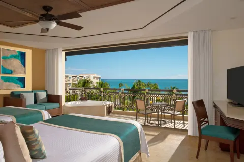 premium ocean view room with two beds at Dreams Riviera Cancun Resort & Spa.