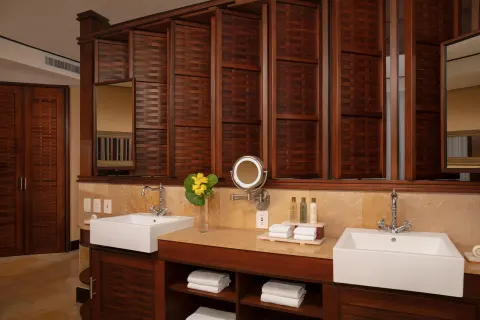 Double-sink bathroom vanity in a guest room at Dreams Riviera Cancun Resort & Spa.