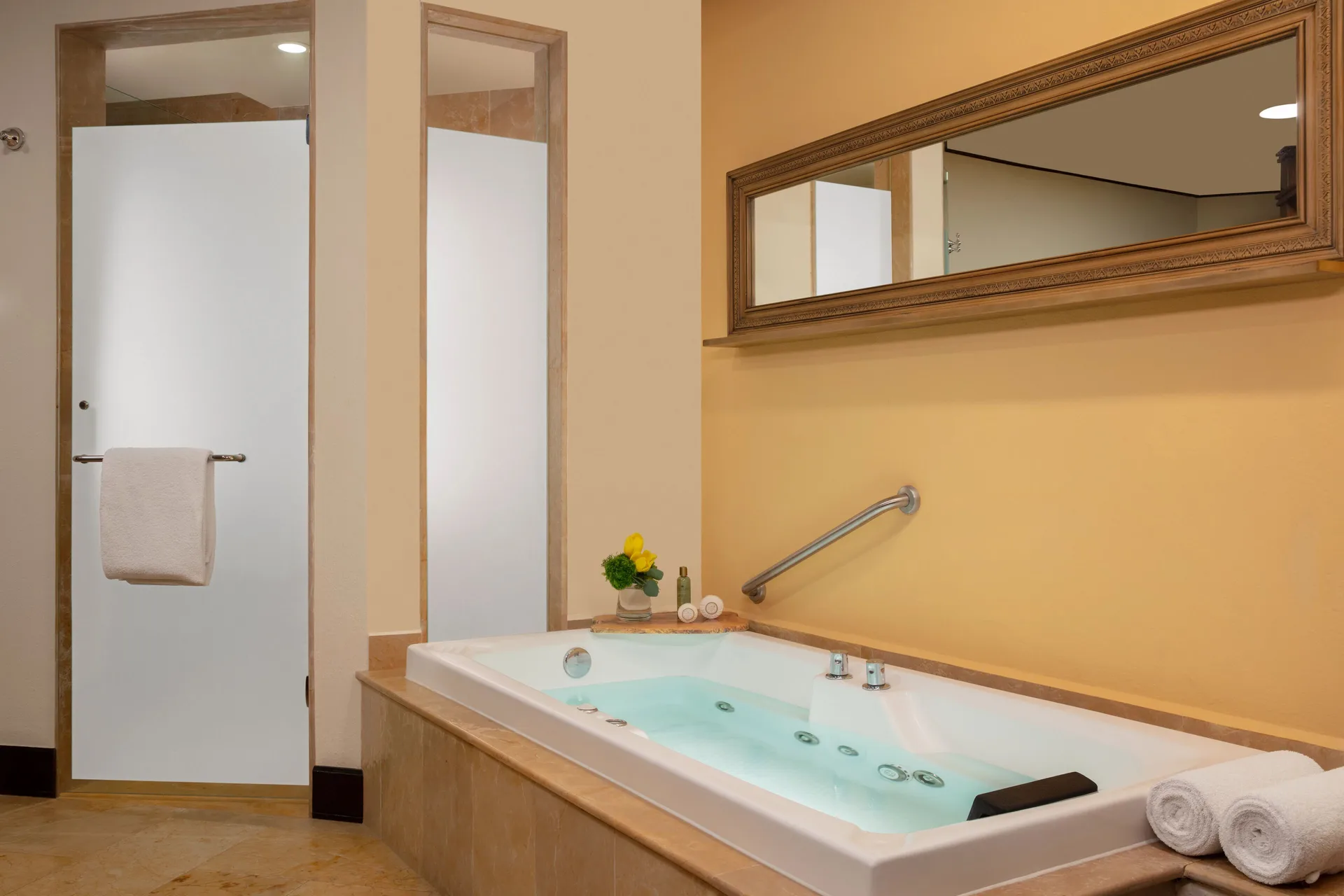Jetted bathtub in a guest bathroom at Dreams Riviera Cancun Resort & Spa.