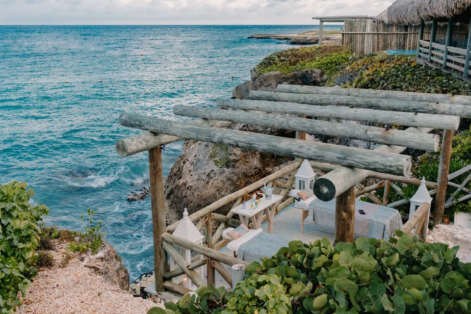 A cliffside treatment terrace overlooks the ocean at Eden Roc Cap Cana.