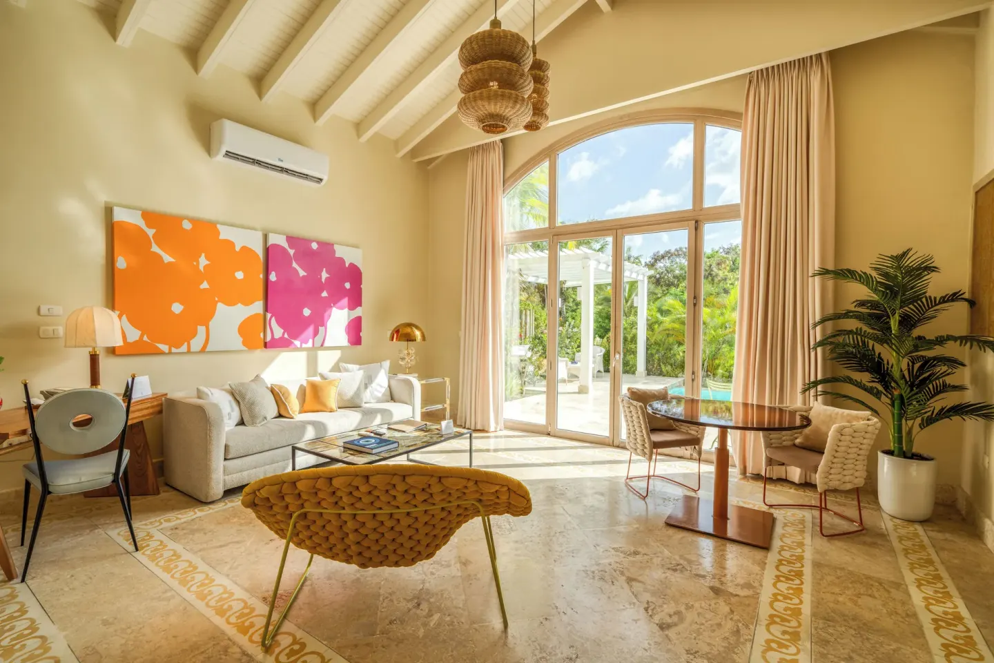 Living room of a Luxury Pool Family Suite with pool terrace at Eden Roc Cap Cana.