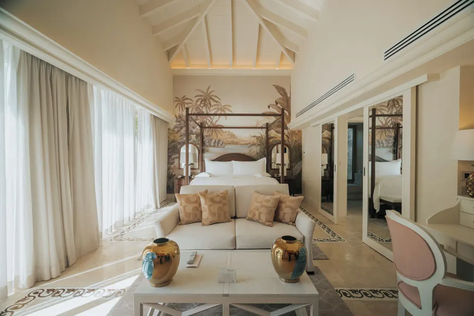Luxury Pool Junior Suite king bed and sitting area at Eden Roc Cap Cana.