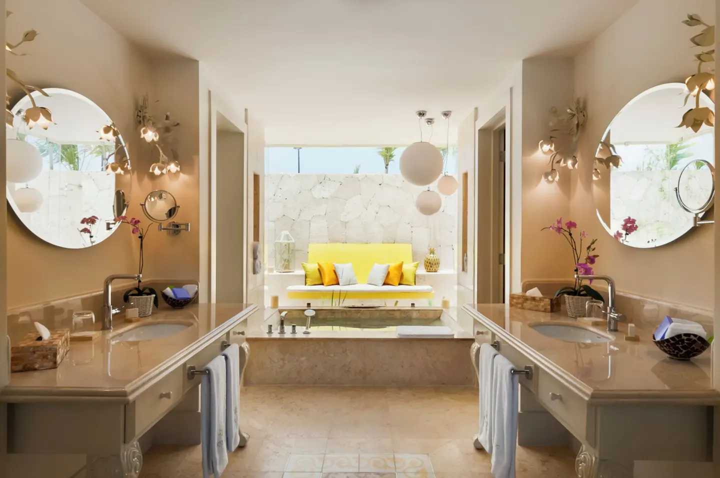 Luxury Pool One Bedroom Suite bathroom with dual vanities and tub at Eden Roc Cap Cana.