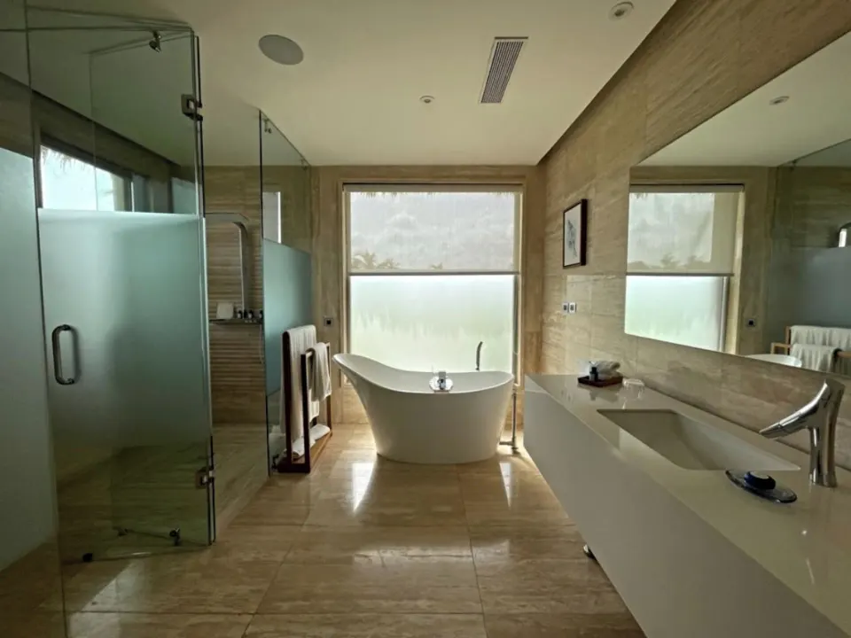 Beachfront One Bedroom Suite bathroom with soaking tub at Eden Roc Cap Cana.