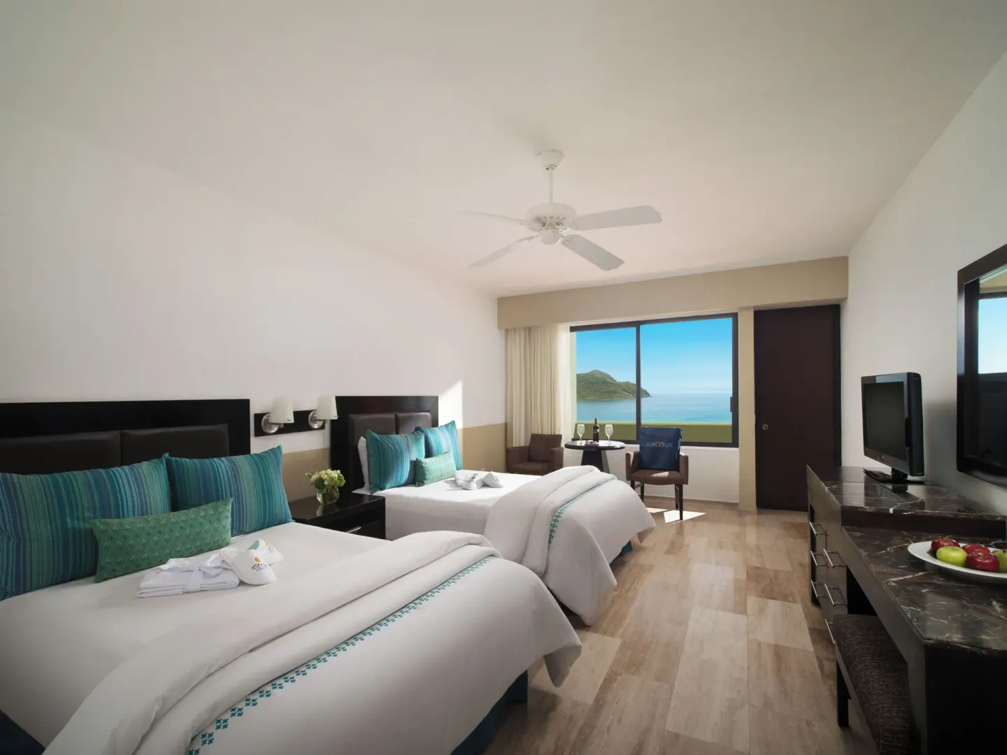 Standard Ocean View room with two beds and sea view at El Cid Castilla Beach Hotel.
