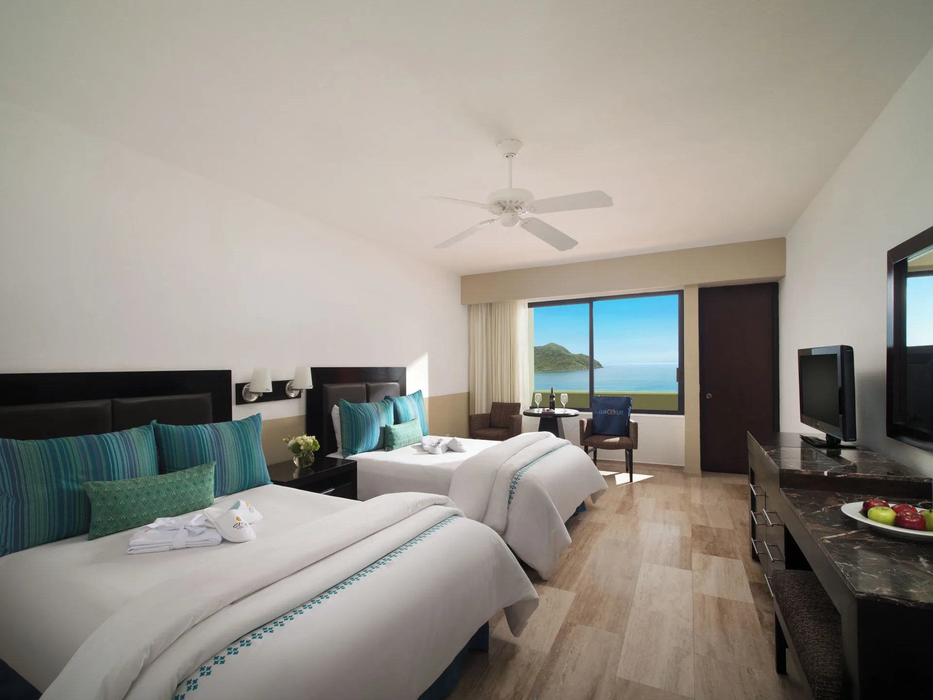 Standard Ocean View room with two beds and sea view at El Cid Castilla Beach Hotel.