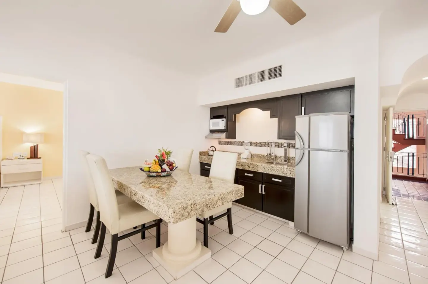 Suite kitchen and dining area at El Cid Marina Beach Hotel.
