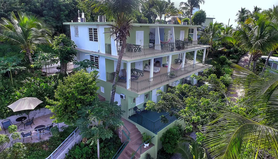 Sea Gate Hotel casual Vieques hotel with guesthouse-style charm, colorful buildings, and tropical garden surroundings in Vieques, Puerto Rico.