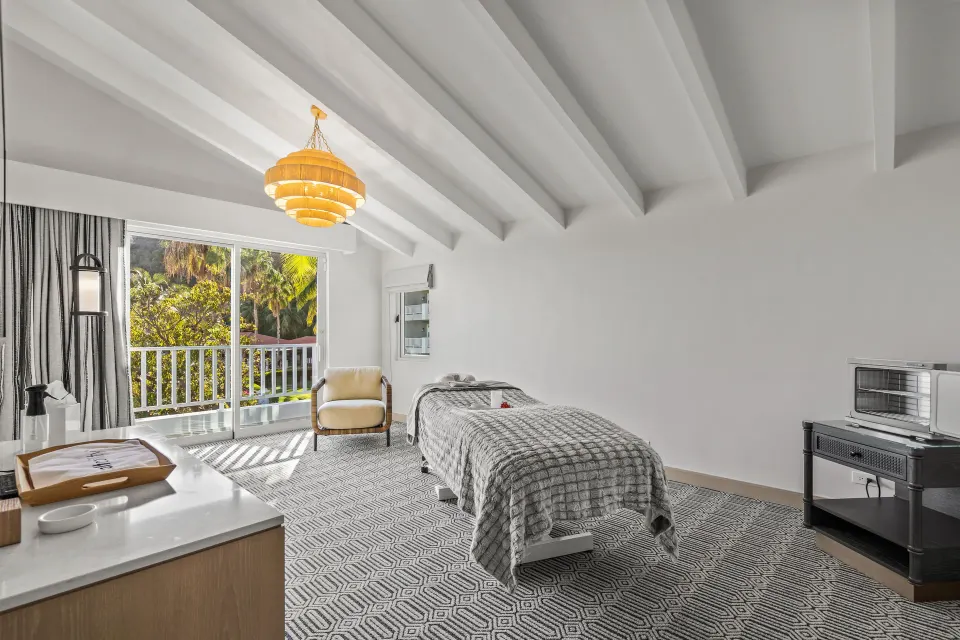 Massage treatment room with balcony at El Conquistador Resort.