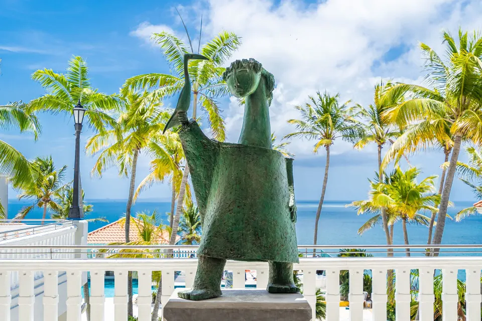 Bronze statue on a seaside terrace at El Conquistador Resort.