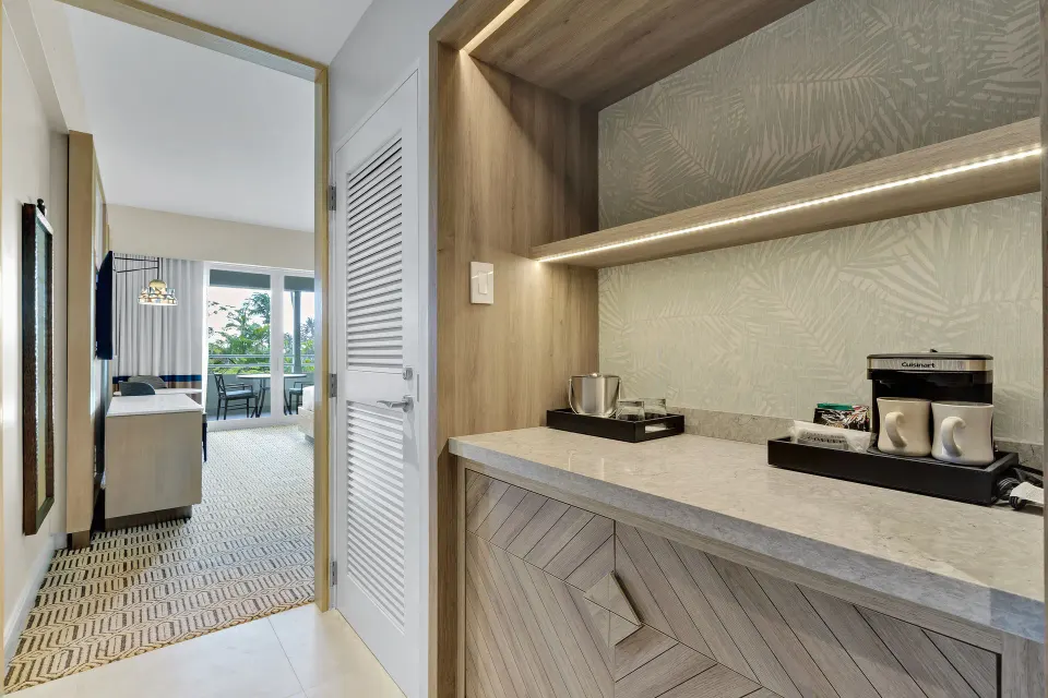 Coffee station and entry area in a Deluxe Marina View Room at El Conquistador Resort.