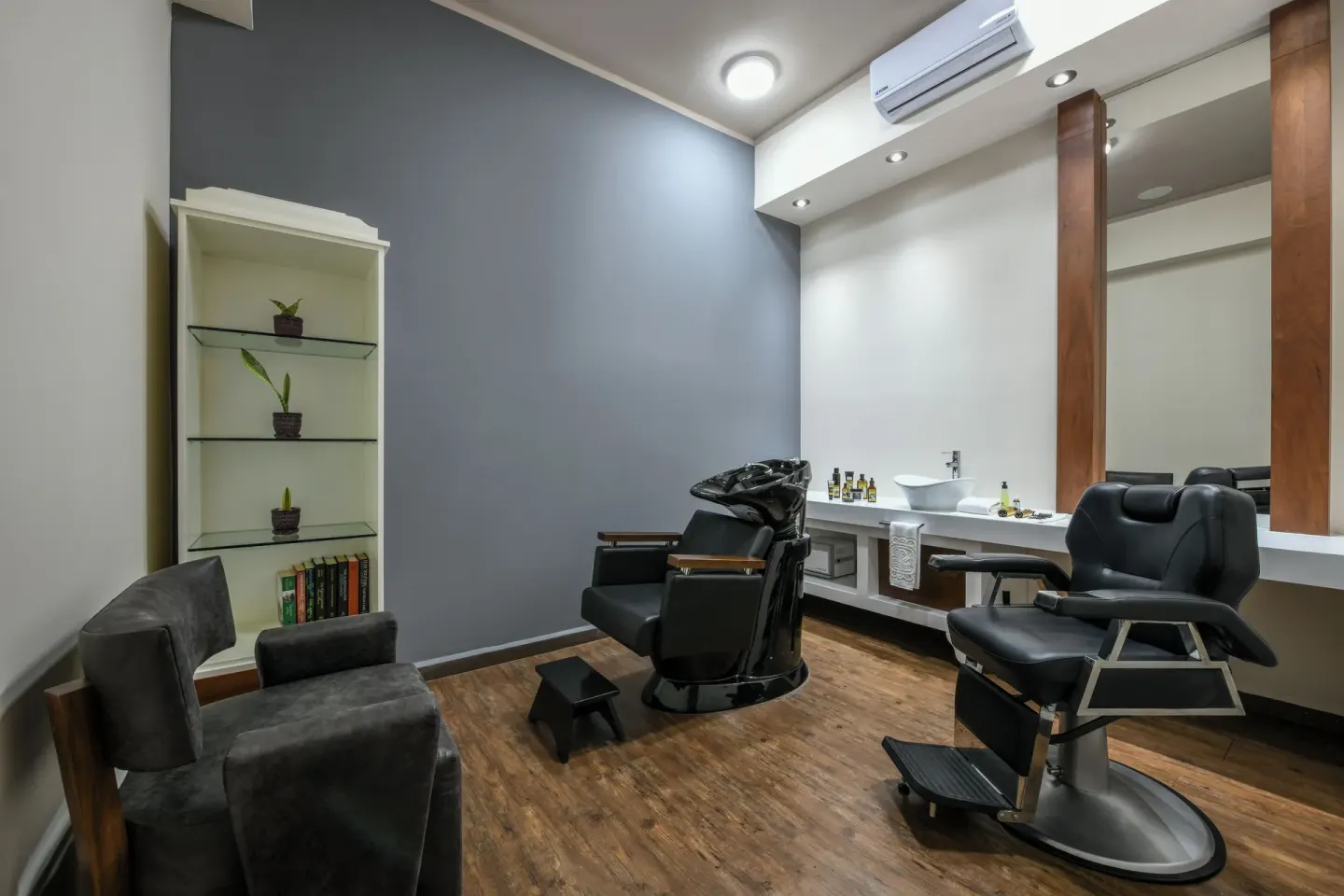 Barbershop-style salon room with grooming chairs at El Dorado Casitas Royale.
