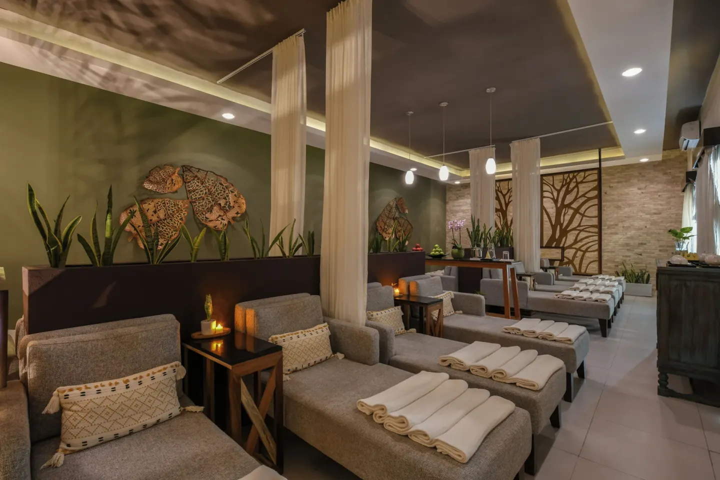 Spa relaxation lounge with cushioned chaise seating at El Dorado Casitas Royale.