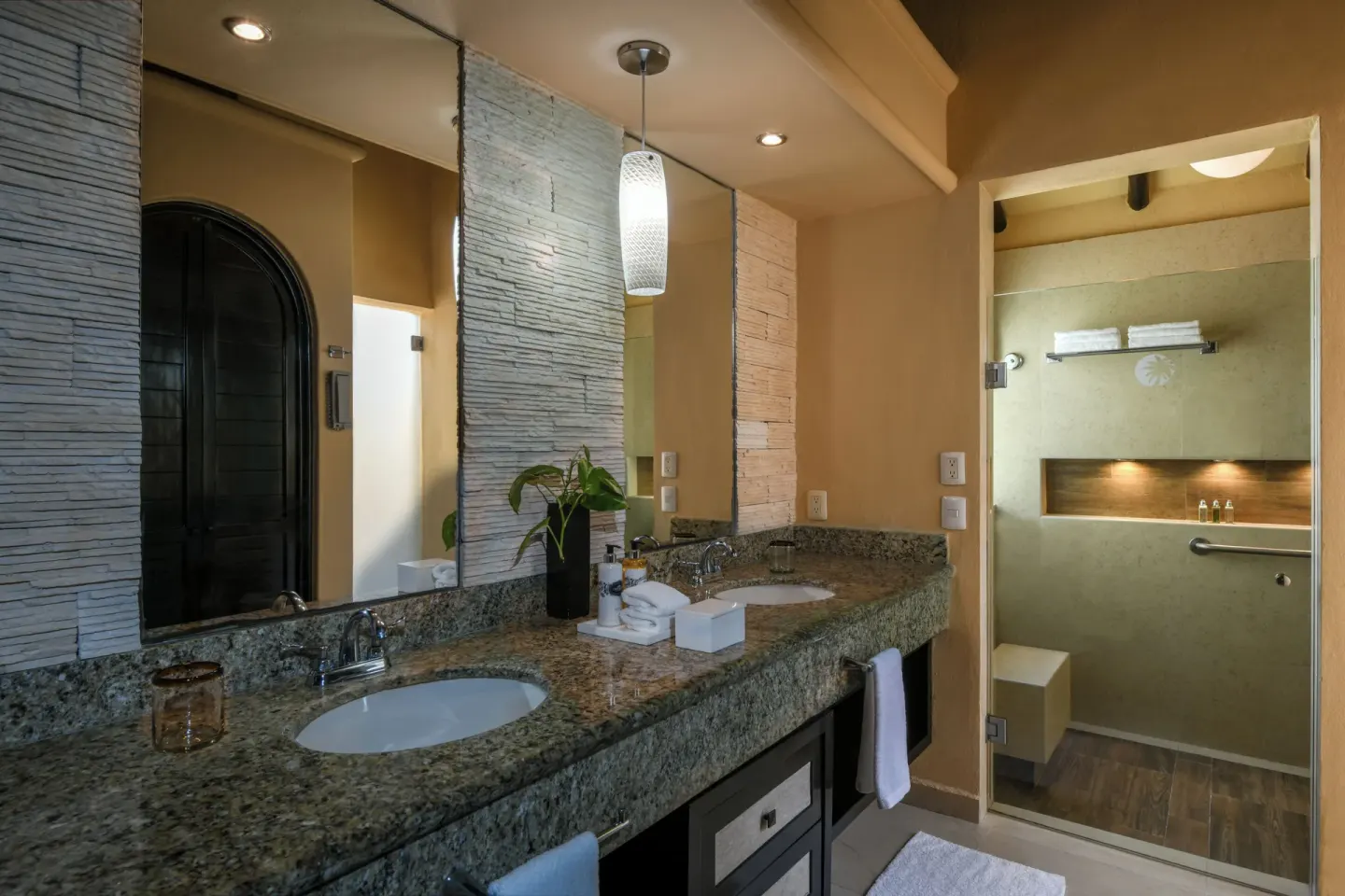 Private Pool Casita Suite bathroom vanity and shower at El Dorado Casitas Royale.