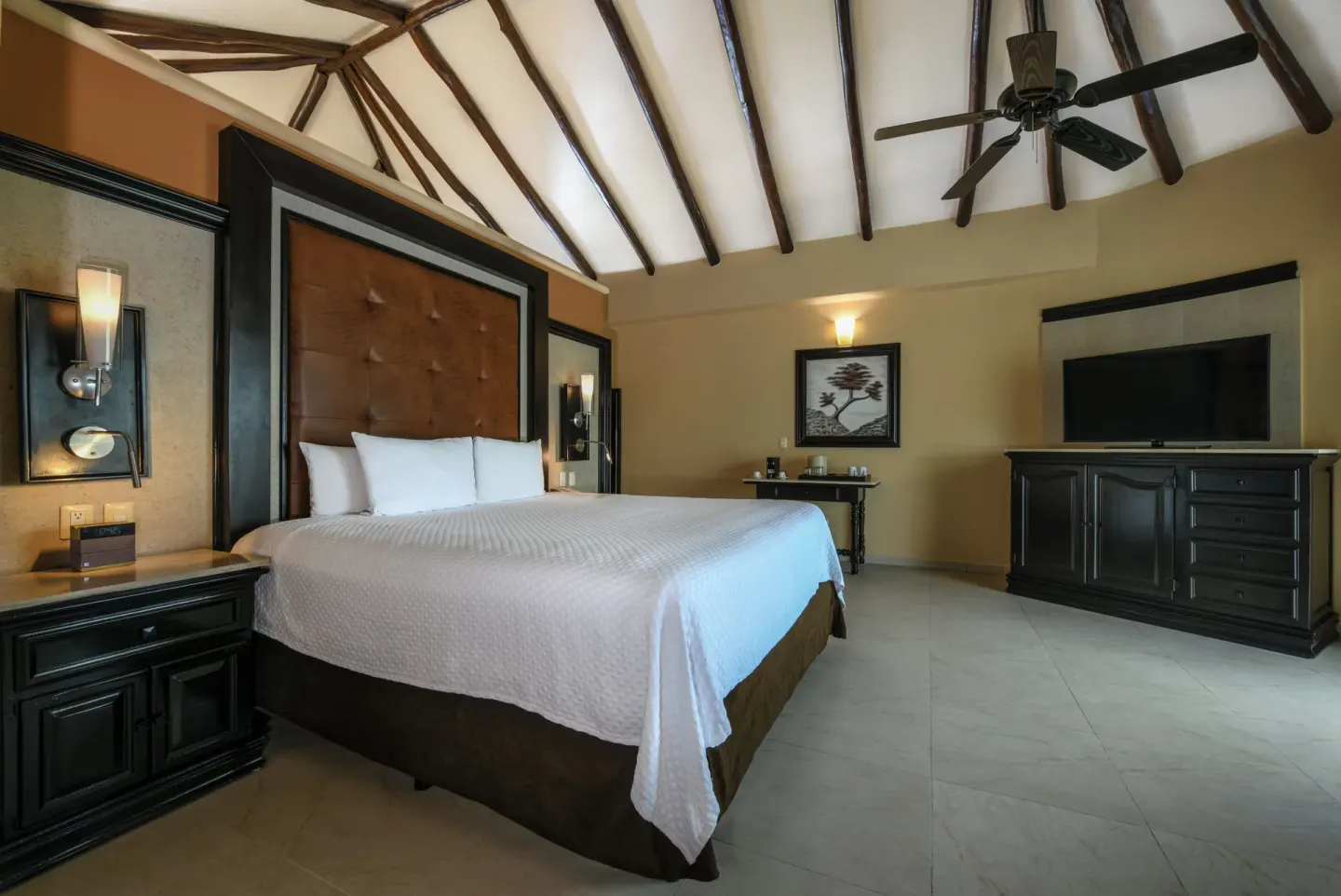 Private Pool Casita Suite king bed with vaulted ceiling at El Dorado Casitas Royale.