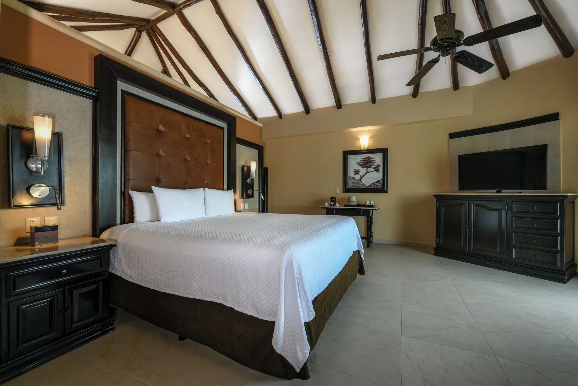 Private Pool Casita Suite king bed with vaulted ceiling at El Dorado Casitas Royale.
