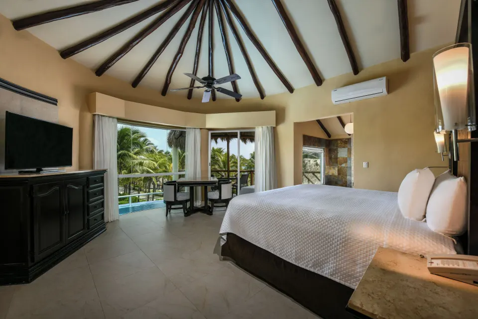 Private Pool Casita Suite king bedroom with balcony views at El Dorado Casitas Royale.
