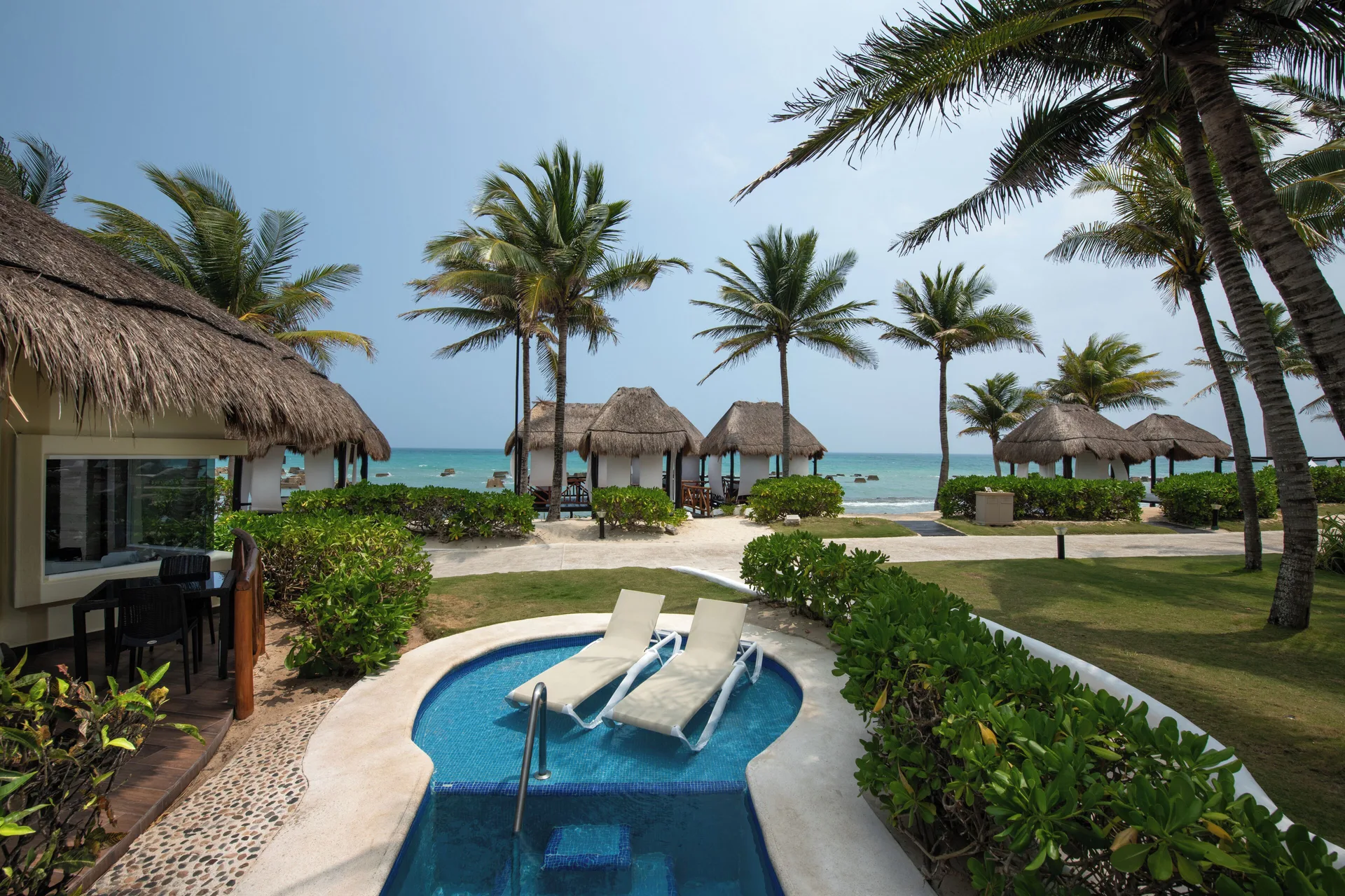 Swim Up Casita Suite plunge pool and beachfront casitas at El Dorado Casitas Royale.