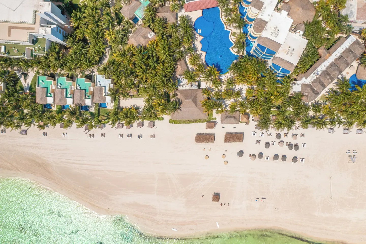 Aerial view of the beachfront resort at El Dorado Maroma Cenote, Underground Expedition.
