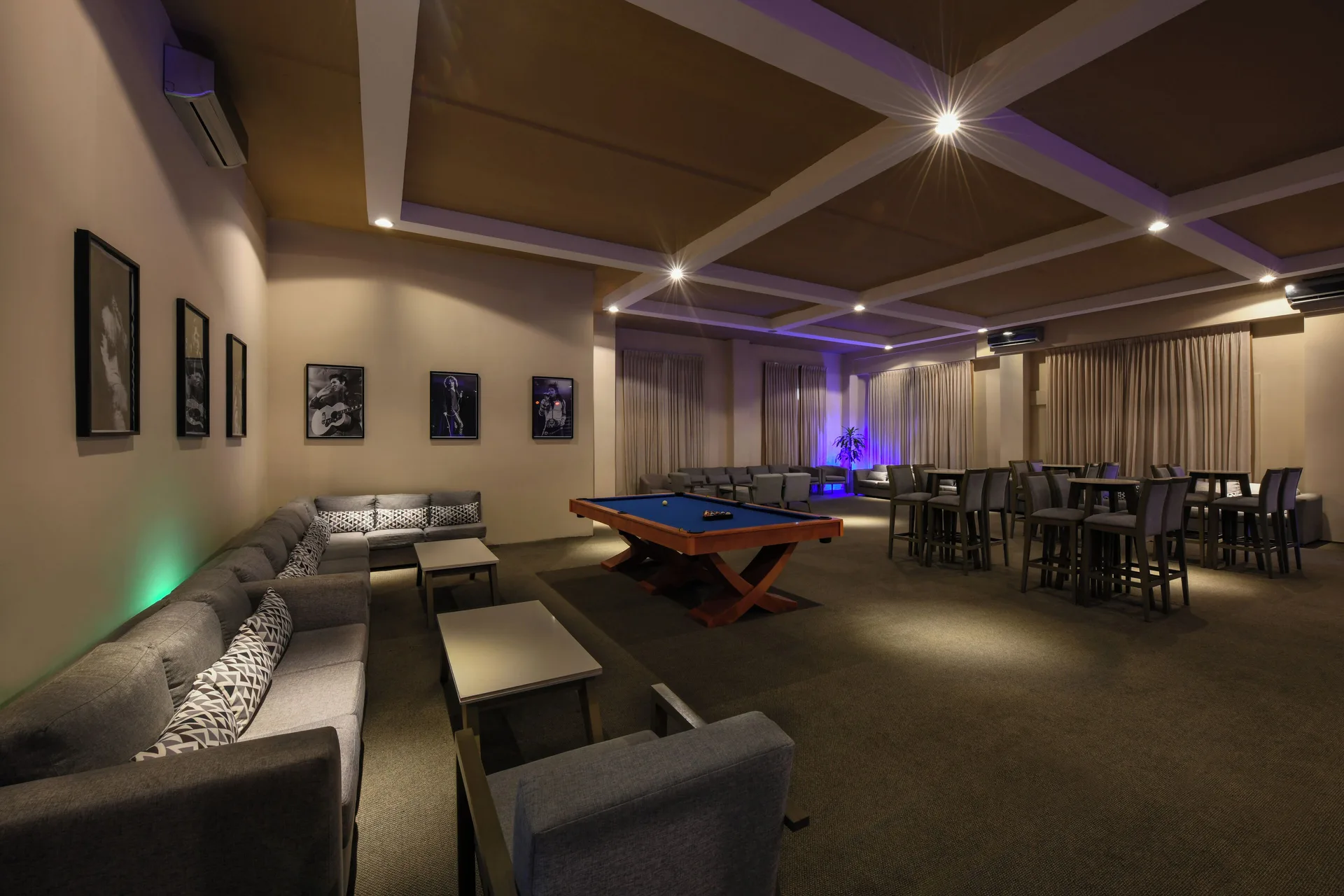 Lounge with pool table and sofas at El Dorado Maroma Cenote, Underground Expedition.