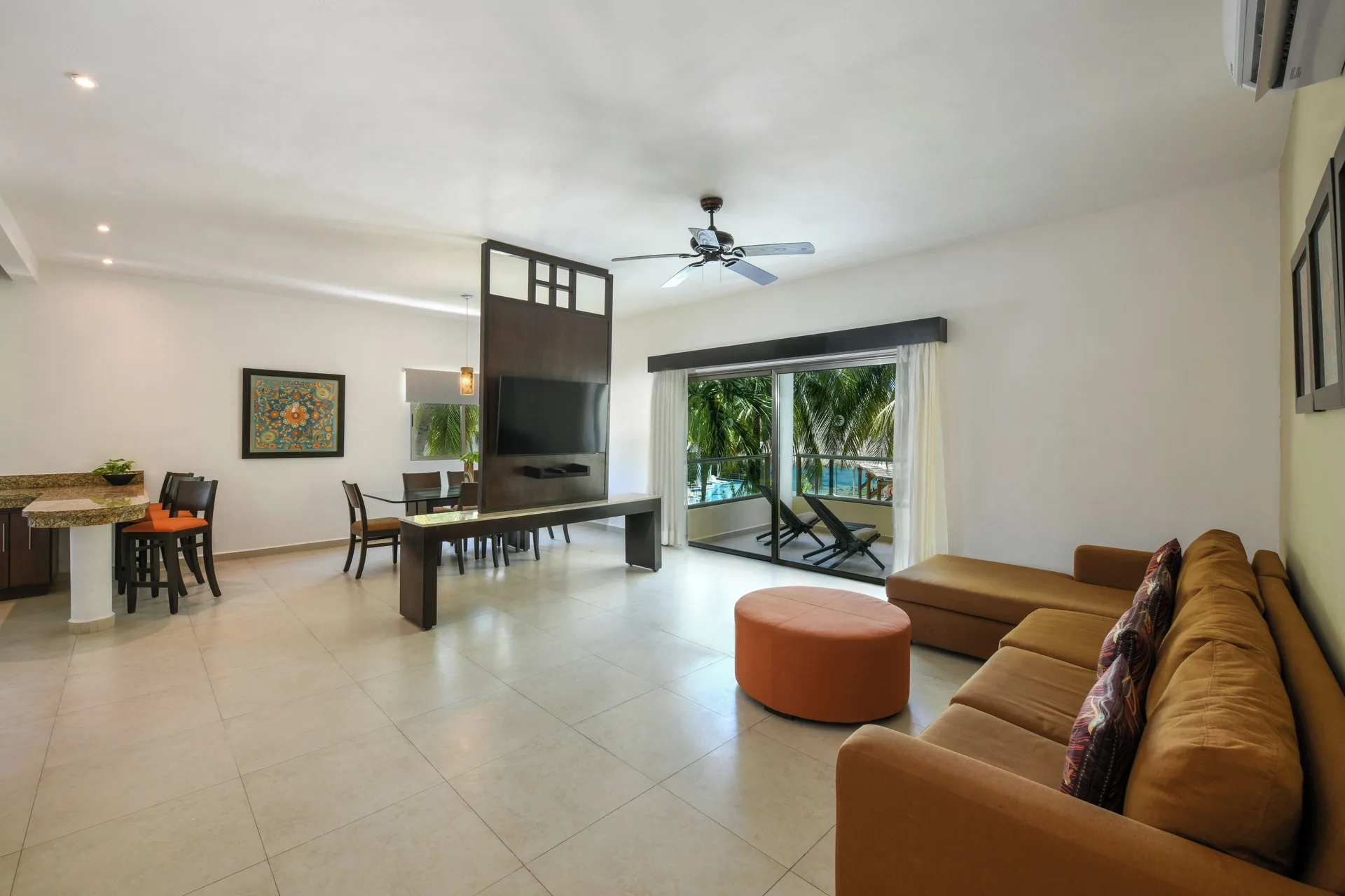 Royal Retreat studio living room with balcony at El Dorado Maroma Cenote, Underground Expedition.