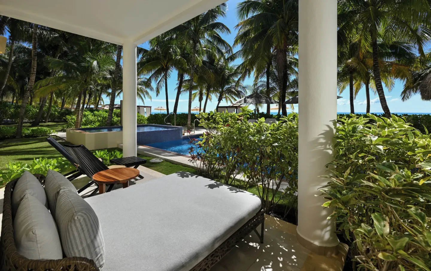 Royal Retreat Haven Suite terrace with daybed and plunge pool at El Dorado Maroma Cenote, Underground Expedition.