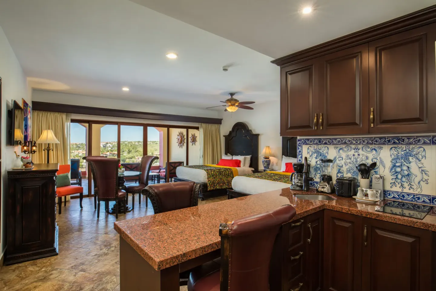 Luxury Suite two-bed room with kitchenette at El Encanto at Hacienda Encantada.