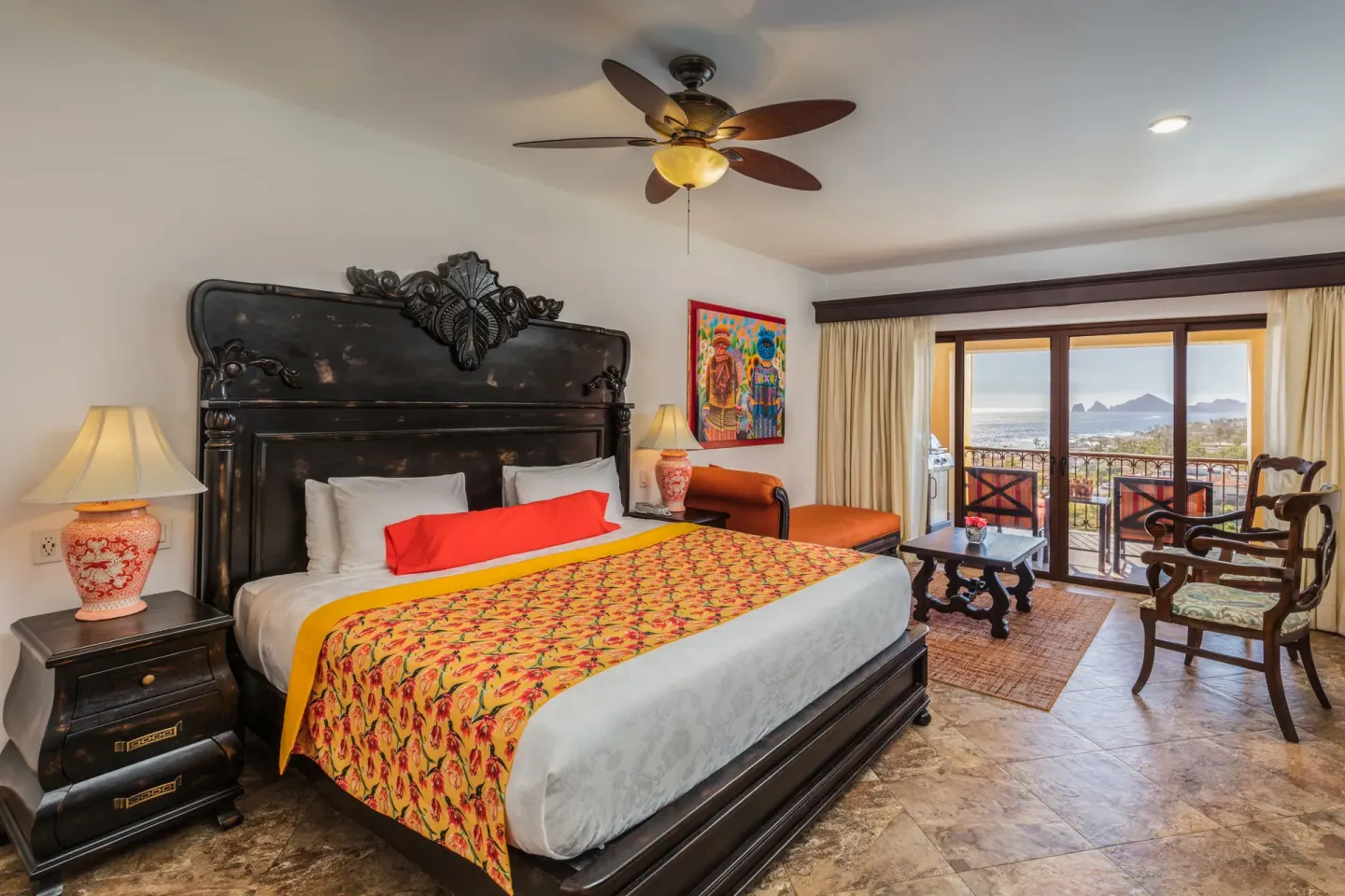 Premium Suite king bed and ocean-view balcony at El Encanto at Hacienda Encantada.