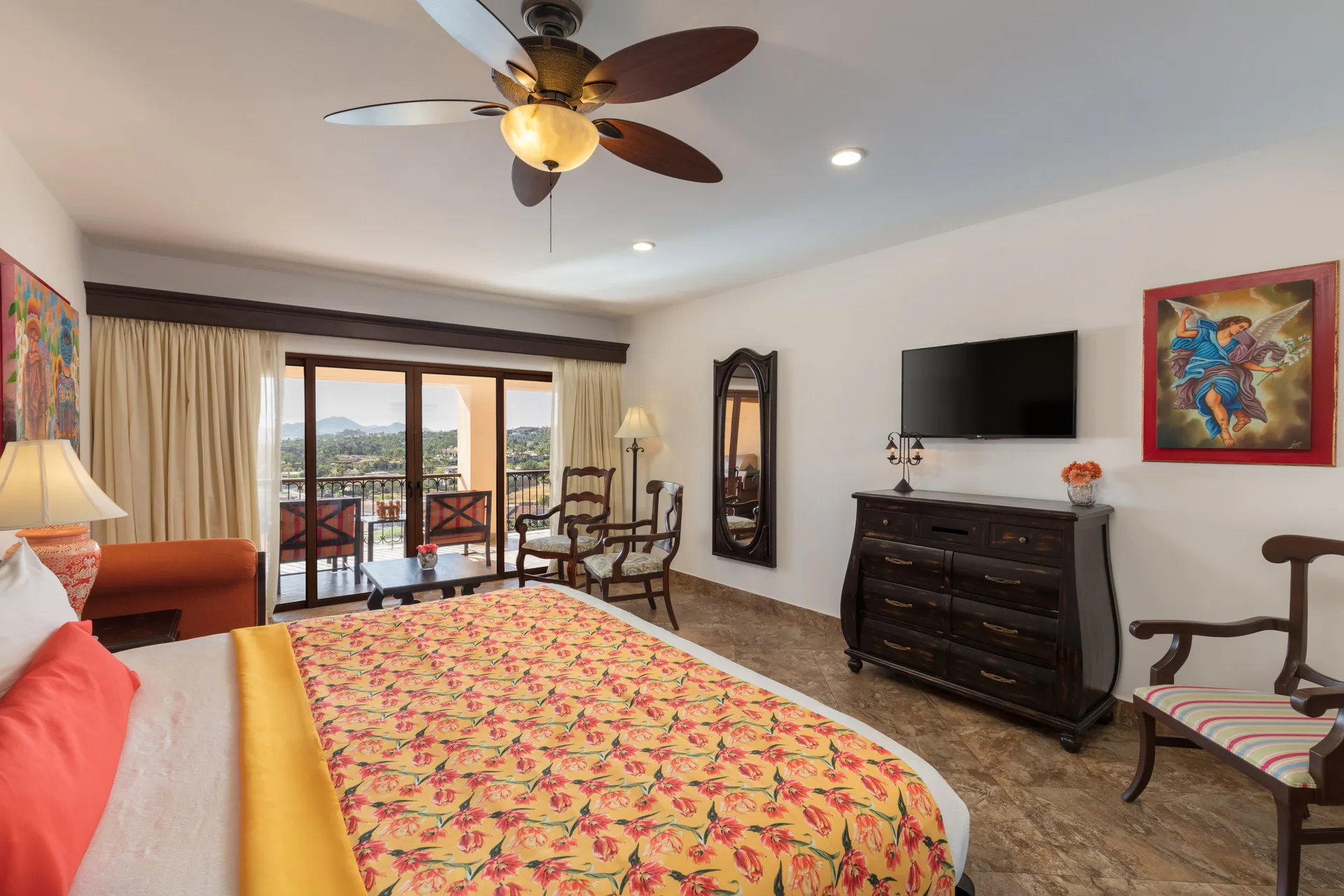 Premium Suite king bedroom with balcony seating at El Encanto at Hacienda Encantada.