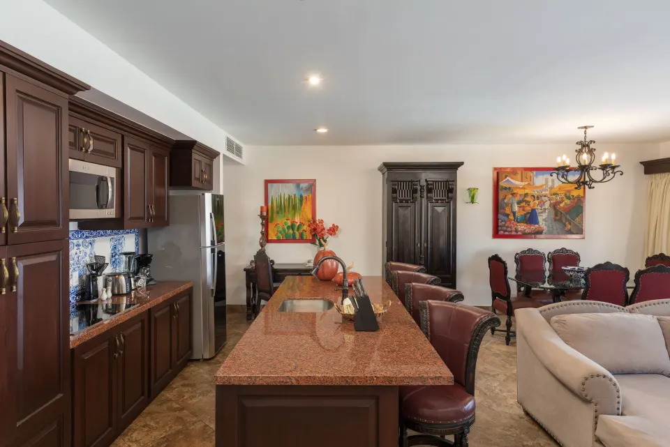 Premium Suite kitchen, dining area, and sofa at El Encanto at Hacienda Encantada.