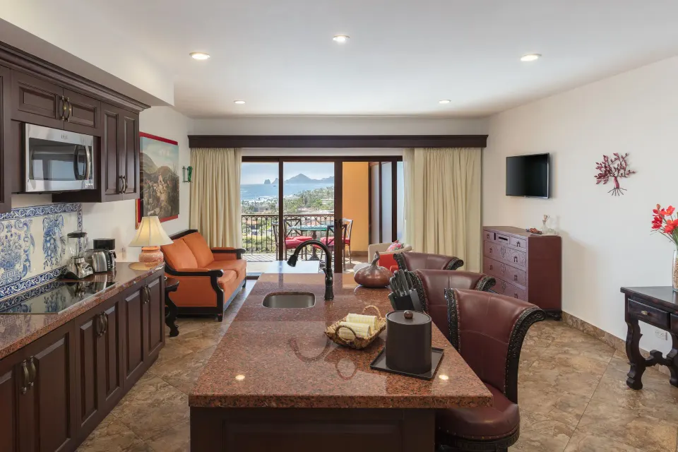 Premium Suite living area and kitchen with ocean balcony at El Encanto at Hacienda Encantada.