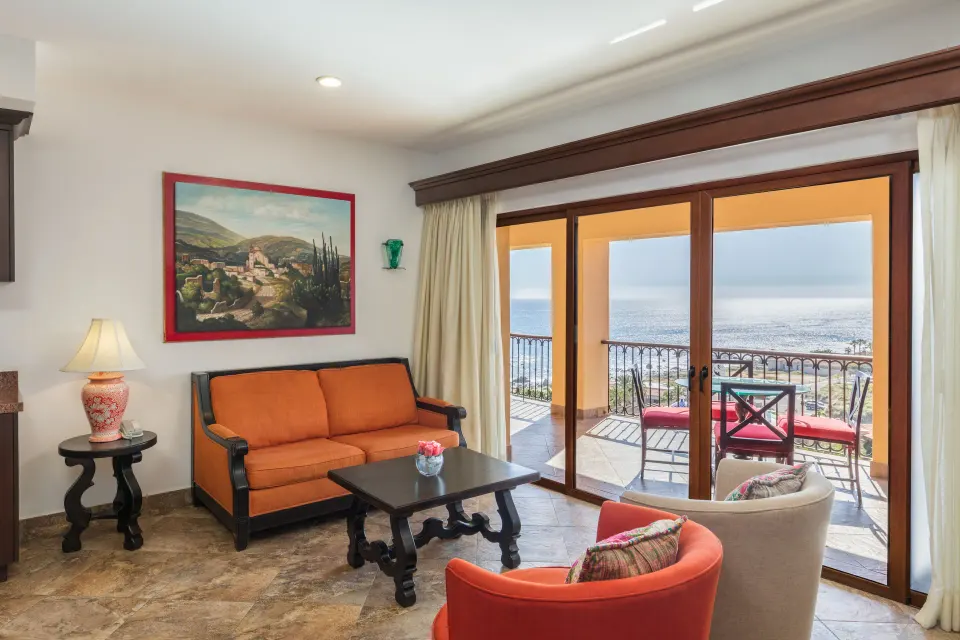 Premium Suite living room with balcony ocean view at El Encanto at Hacienda Encantada.