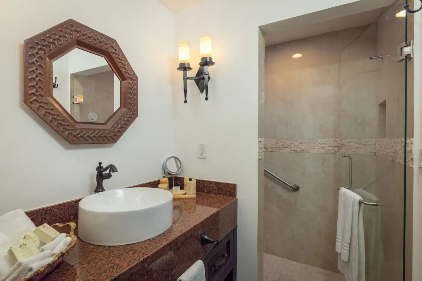 Studio Garden View bathroom vanity and glass shower at El Encanto at Hacienda Encantada.