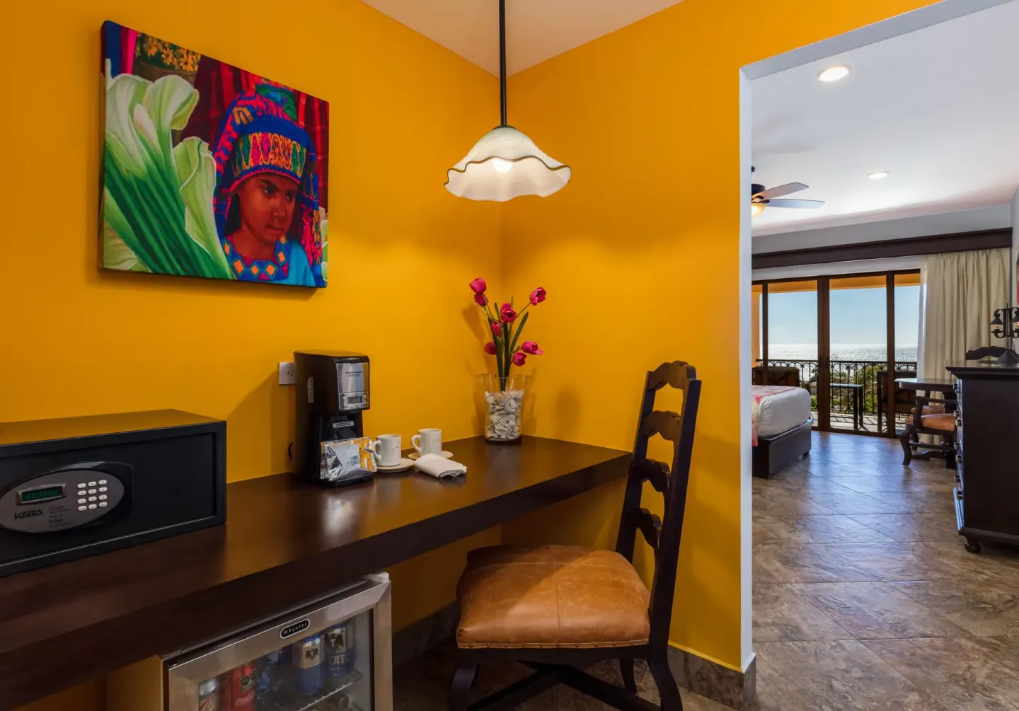 Studio kitchenette and desk area near the bedroom at El Encanto at Hacienda Encantada.